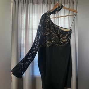 Women’s black cocktail dress.